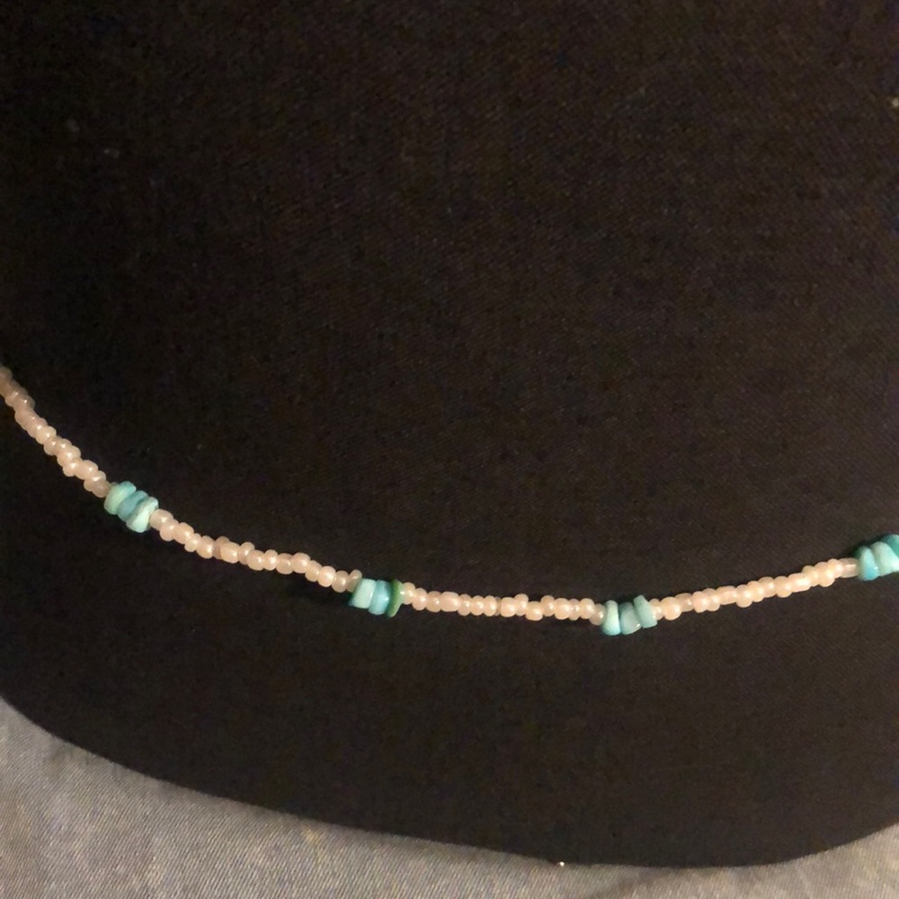 Light blue and white stone with white belly beads